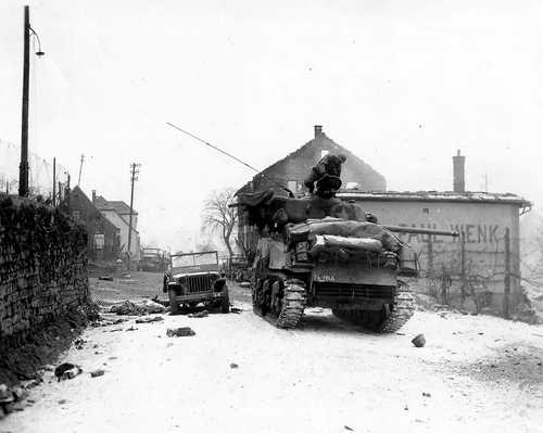 A Sherman tank pauses