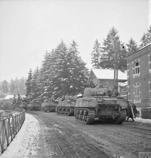 Column of Sherman tanks