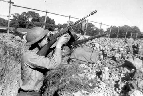 LOYAL EDDY THOMPSON FIRING AT AIRCRAFT