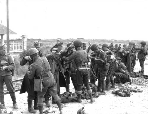 German prisoners beging searched