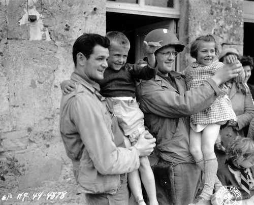 Soldiers Holding Children