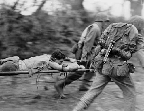 Carrying a wound Marine
